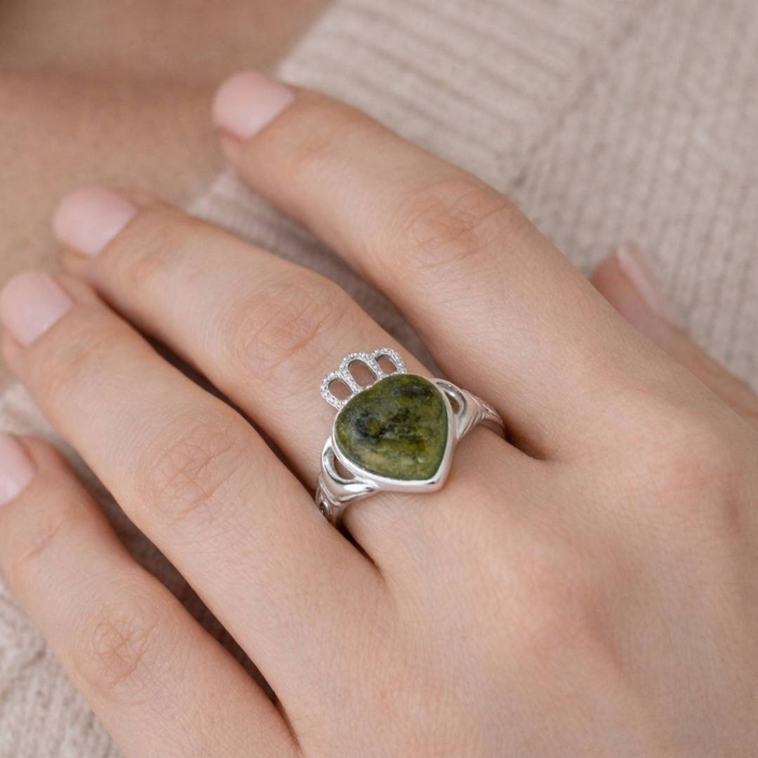 Connemara marble heart Claddagh ring is a partnership of 900 million year old green marble and hallmarked Irish sterling silver.