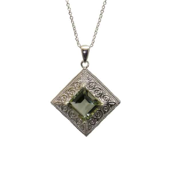 Green Amethyst necklace with Celtic design presented on a 24 inch chain, handcrafted in Ireland. Beauty and tranquility in the soothing green gemstone.