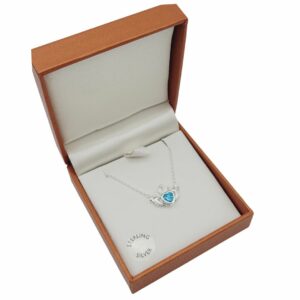 Sky Blue Claddagh Pendant. Handcrafted in Ireland with Sterling Silver and presented on an 18" chain. Boxed. Special Event Piece.