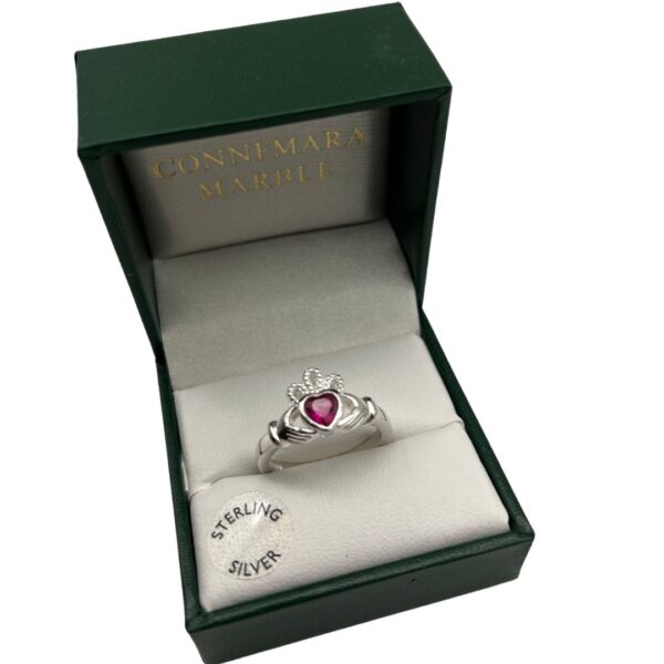 Ruby Red Silver Claddagh Ring. Handcrafted in Ireland. Special Event Piece. Hallmarked silver and presented gift boxed. Love, loyalty and friendship.