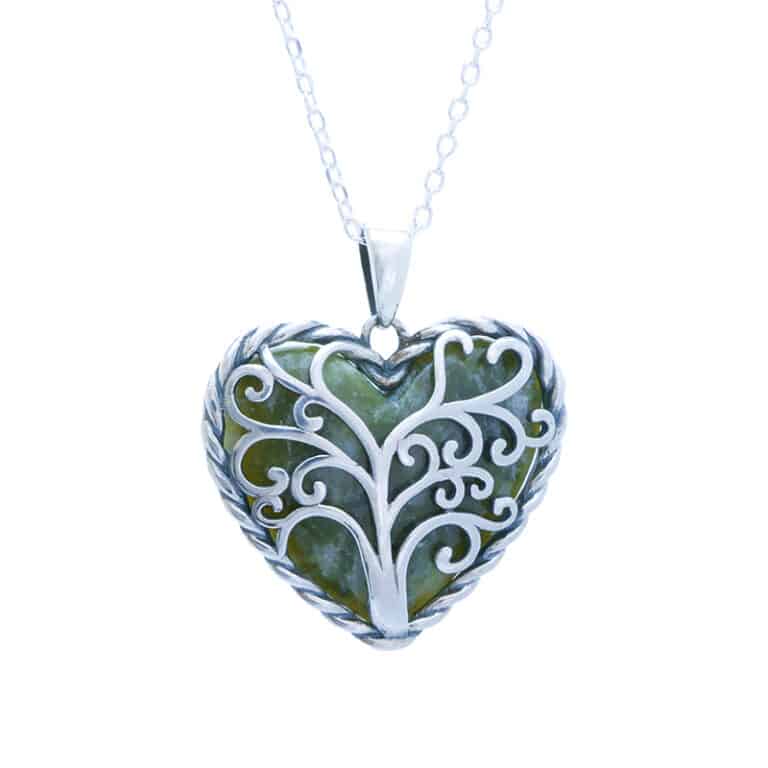 Tree of Life Silver Heart Pendant is a romantic piece of Celtic Jewelry. Handcrafted with intricate sterling silver and natural Connemara Marble.