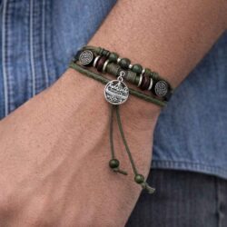 Viking Hippy Style Bracelet, made in Ireland with leather and genuine Connemara Marble. Adjustable slide closure, 8mm beads and silver tone charm.