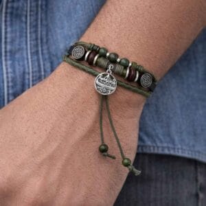 Viking Hippy Style Bracelet, made in Ireland with leather and genuine Connemara Marble. Adjustable slide closure, 8mm beads and silver tone charm.