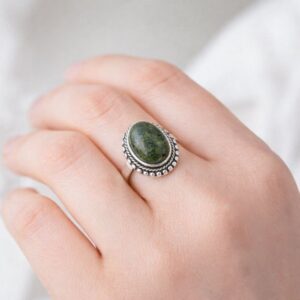 Solitaire Connemara Marble Sterling Silver Ring. Handcrafted in Ireland with natural green marble and hallmarked Irish Silver.