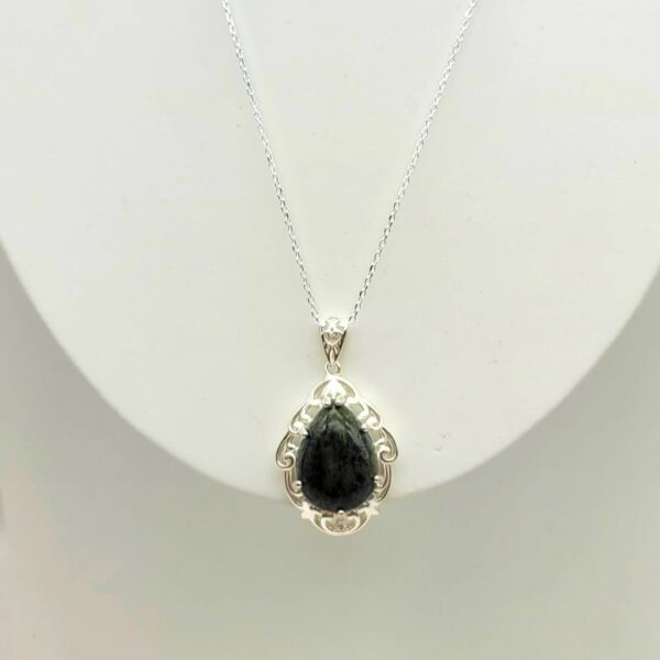 Tear drop shape Connemara Marble Pendant. Handcarved in Ireland with genuine Connemara Marble and Irish Sterling Silver. 18" chain included.