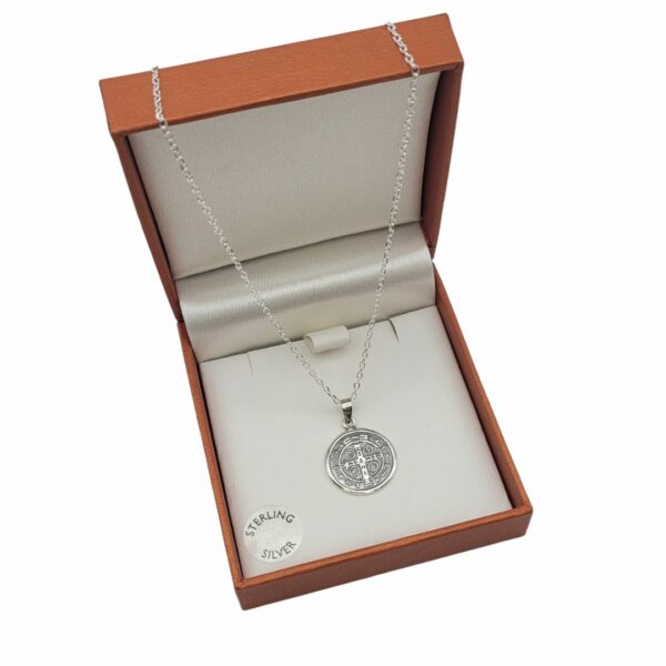 St. Benedict Sterling Silver 925 Pendant. Handcrafted in Ireland and presented on an 18" chain. Held within a hinged gift box.