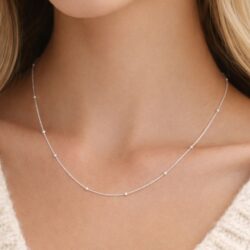 This sterling silver elongated link ball chain necklace offers a contemporary yet timeless look perfect worn alone or layered. Hallmarked in Ireland.