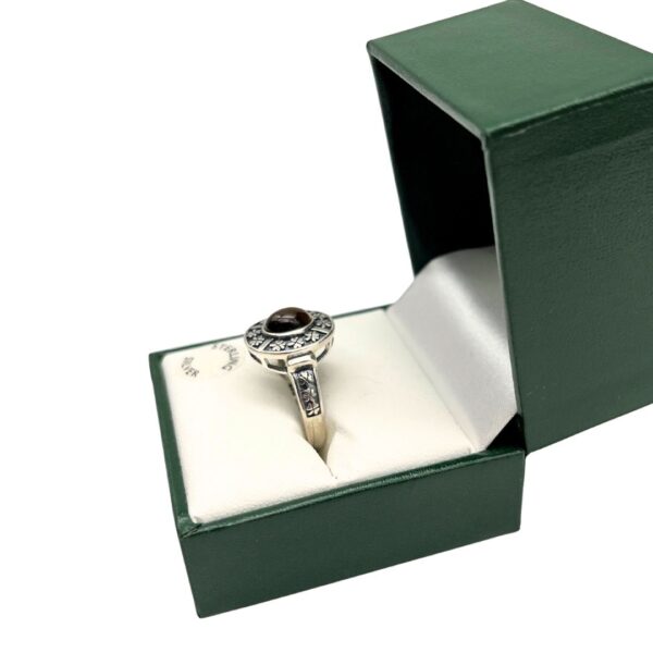 Silver Tiger's Eye ring from Ireland with oxidized shamrock motif silver work. Handcrafted in Ireland and hallmarked for quality. Presented gift boxed.