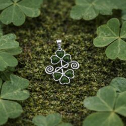 Beautiful sterling silver double shamrock necklace set with genuine Connemara marble. An elegant Irish-inspired gift with rich green tones.