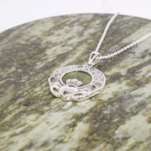Sterling silver with Marcasite gemstone Irish Claddagh pendant. Hand crafted in Ireland with genuine, green Connemara Marble and hallmarked silver.
