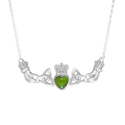 Our Claddagh necklace is hand crafted in Ireland with Irish sterling silver and a beautifully cut Connemara Marble heart. Love, loyalty and friendship.