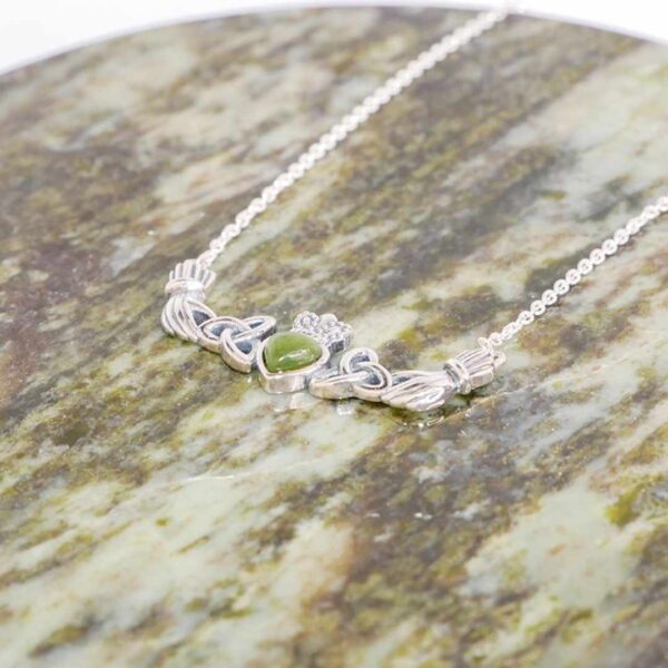 Our Claddagh necklace is hand crafted in Ireland with Irish sterling silver and a beautifully cut Connemara Marble heart. Love, loyalty and friendship.