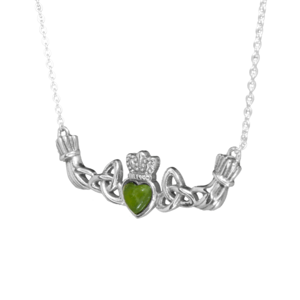 Our Claddagh necklace is hand crafted in Ireland with Irish sterling silver and a beautifully cut Connemara Marble heart. Love, loyalty and friendship.