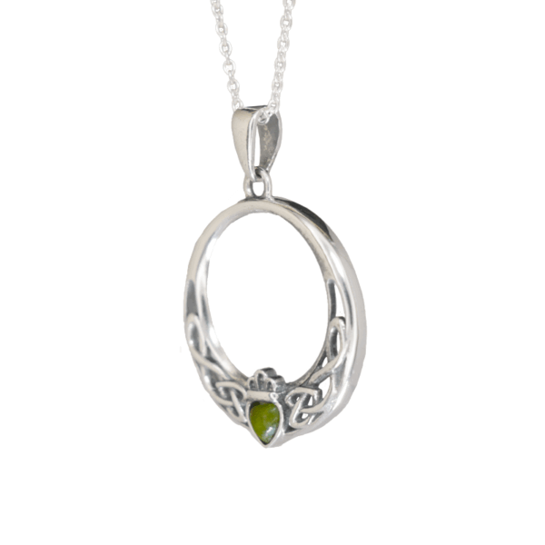 This claddagh pendant is hand crafted with Irish sterling silver and a beautifully cut Connemara Marble heart. View our Claddagh range on our website.