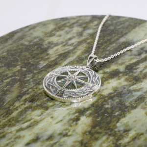 Find your way with our Connemara Marble sterling silver compass pendant. Handcrafted in Ireland with genuine Connemara Marble and gift boxed.