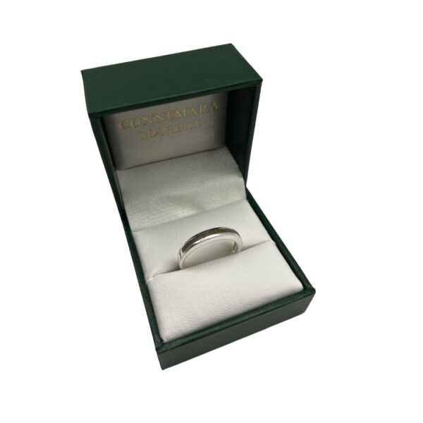 Handcrafted in Ireland, Connemara Marble is a rare, 900 million year old gemstone. Irish sterling silver highlights the sleek, natural marble.