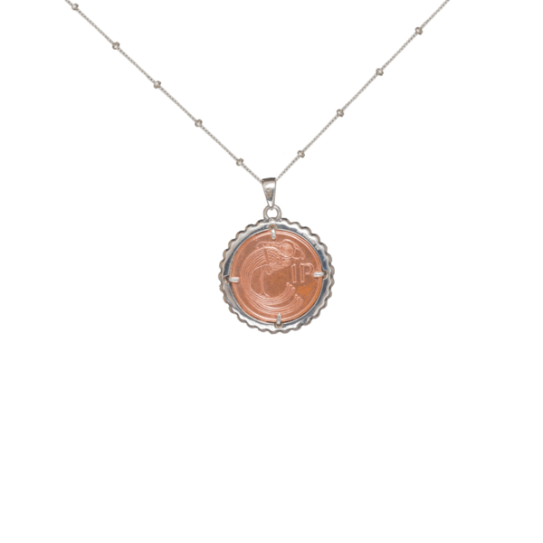 Lucky Irish coin sterling silver pendant. Hand crafted in Ireland with a genuine 1p coin minted between 1973 - 2002. Presented on an 18" silver chain.