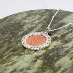 Lucky Irish coin sterling silver pendant. Hand crafted in Ireland with a genuine 1p coin minted between 1973 - 2002. Presented on an 18