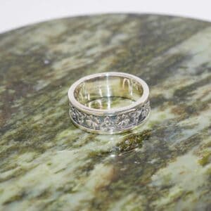 Symbols of Ireland silver band ring has been hand crafted in Ireland with hallmarked Irish sterling silver. Celebrate your Irish heritage with Celtic style.