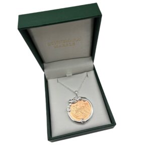 Sterling Silver 2 pence Irish coin pendant. Genuine coin, minted in Ireland. Presented on an 18" chain and held within a hinged gift box.