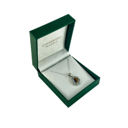 Silver Tiger's Eye pendant from Ireland with oxidized shamrock motif silver work. Handcrafted in Ireland and hallmarked for quality. Presented gift boxed.