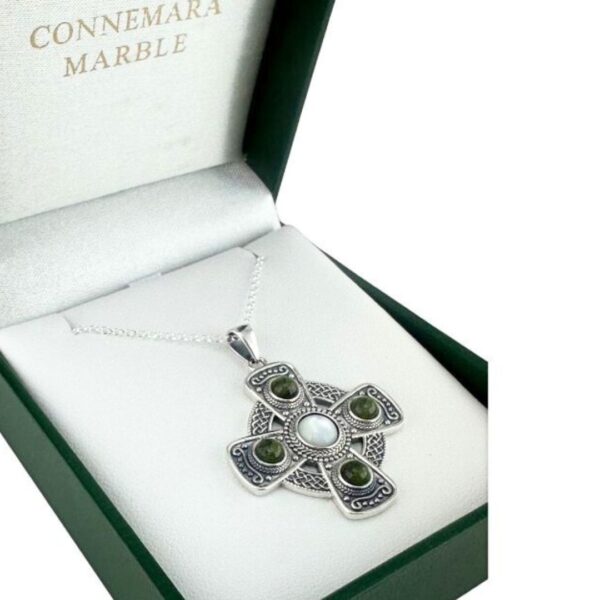 Connemara Marble Silver Celtic Cross pendant hand crafted in Ireland with our authentic natural gemstone and hallmarked Irish silver. 18" Chain included.