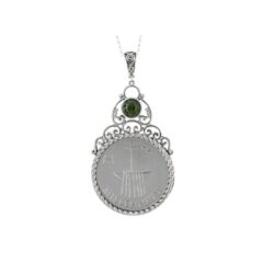 Connemara Marble sterling silver Millennium coin pendant. This is a genuine coin minted only for one year in the year 2,000. Presented gift boxed.