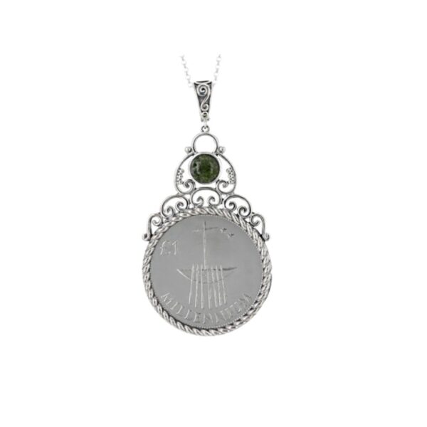 Connemara Marble sterling silver Millennium coin pendant. This is a genuine coin minted only for one year in the year 2,000. Presented gift boxed.