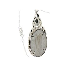 Connemara Marble sterling silver Millennium coin pendant. This is a genuine coin minted only for one year in the year 2,000. Presented gift boxed.