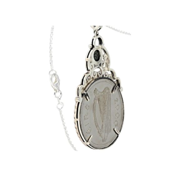 Connemara Marble sterling silver Millennium coin pendant. This is a genuine coin minted only for one year in the year 2,000. Presented gift boxed.