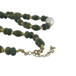 Inspired by the beach at Galway Bay on a summer evening. Our green, Connemara Marble gemstone necklace with pearl center. Special Event piece.