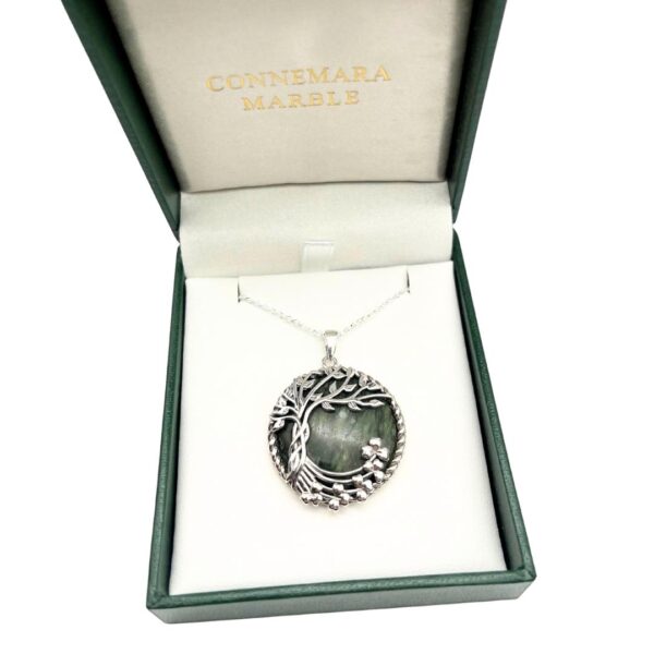 Fairy tree with Irish sterling silver over genuine Connemara Marble. Handcrafted in Ireland and presented on an 18" chain.