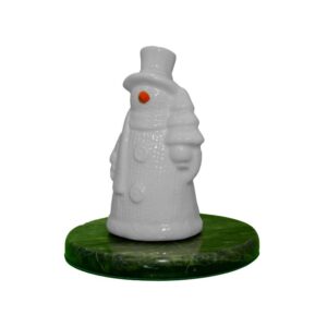 Add Irish charm to your holidays with this porcelain snowman in an Aran sweater, sitting on a Connemara marble base. A festive keepsake gift!