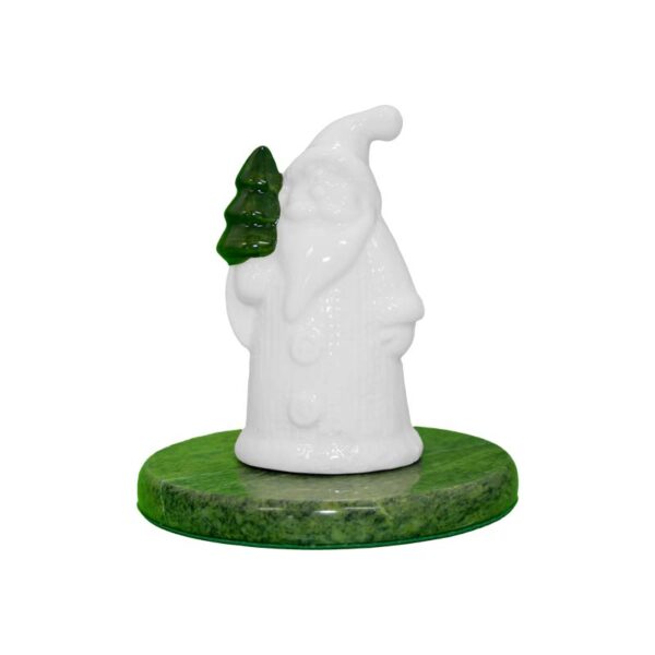 Celebrate Christmas with this porcelain Irish Santa in a traditional Aran-stitch jumper, seated on genuine Connemara marble. A unique Irish holiday gift!