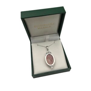 Hallmarked sterling silver Trinity Knot pendant, featuring a cameo-style sandstone gemstone center. Handcrafted in Ireland and elegantly gift boxed.