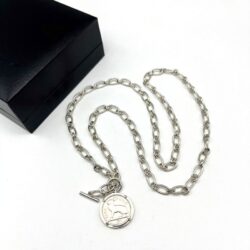 Silver Irish thrupenny coin necklace with T-bar clasp. Hand crafted in Ireland featuring the classic hare design on a genuine collectible Irish coin pendant.