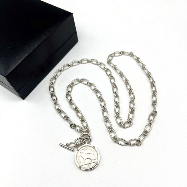 Silver Irish thrupenny coin necklace with T-bar clasp. Hand crafted in Ireland featuring the classic hare design on a genuine collectible Irish coin pendant.