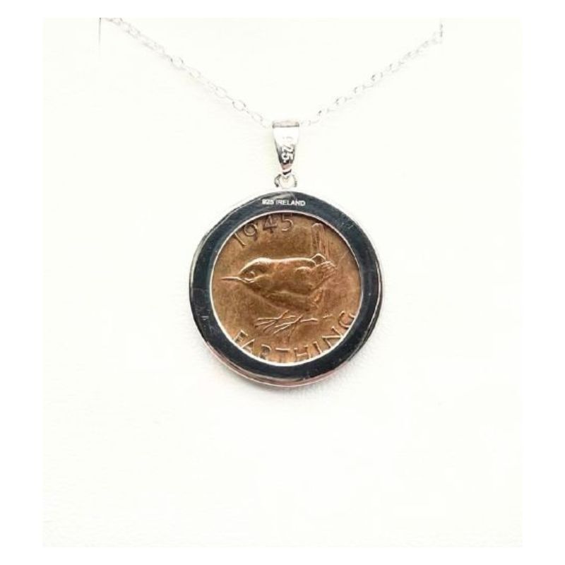 Sterling silver pendant featuring a genuine British Wren Farthing coin. A unique historical necklace perfect for collectors and nature lovers.