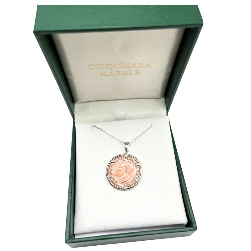 Sterling silver pendant featuring a genuine British Wren Farthing coin. A unique historical necklace perfect for collectors and nature lovers.