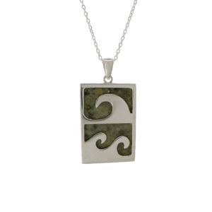Connemara marble Celtic wave pendant in sterling silver, made in Ireland. A timeless Irish jewelry gift inspired by ocean symbolism and Celtic design.