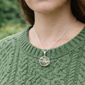 Silver Connemara marble Shamrock and Claddagh pendant necklace with 18" chain. Presented in a premium gift box with a certificate of authenticity.