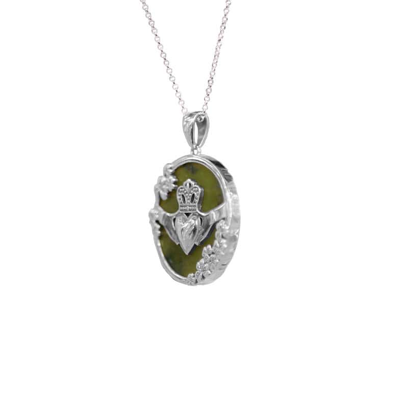 Silver Connemara marble Shamrock and Claddagh pendant necklace with 18" chain. Presented in a premium gift box with a certificate of authenticity.