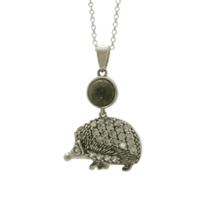 Sterling silver hedgehog necklace made in Ireland with genuine Connemara marble gemstone. A charming Irish jewelry gift inspired by nature.