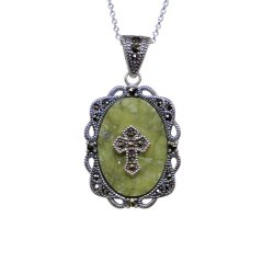 Handcrafted in Ireland , this sterling silver Celtic Cross necklace features genuine Connemara Marble inspired by ancient Irish monuments.