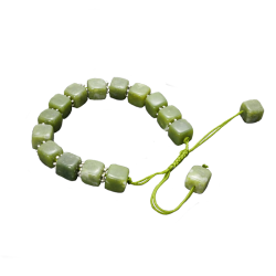 Causeway Bracelet inspired by the Giant’s Causeway, featuring Connemara marble cube beads and silver tone spacers on an adjustable cord.