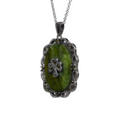 This sterling silver Shamrock pendant features genuine Connemara Marble and sparkling marcasite combining timeless Irish design with subtle shimmer.