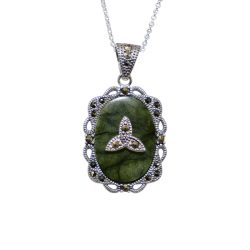 This sterling silver Trinity Knot pendant features genuine Connemara Marble and sparkling marcasite combining timeless Irish design with subtle shimmer.